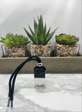 Load image into Gallery viewer, Our hanging car diffusers and air fresheners bring a light and subtle scent to your car that stimulate your senses without being overwhelming.