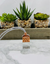 Load image into Gallery viewer, Our hanging car diffusers and air fresheners bring a light and subtle scent to your car that stimulate your senses without being overwhelming.