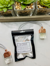 Load image into Gallery viewer, Our hanging car diffusers and air fresheners bring a light and subtle scent to your car that stimulate your senses without being overwhelming.
